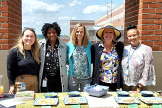 Green team rooftop garden party