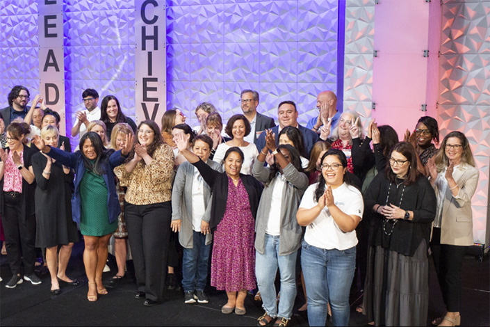 Staff celebrating at ACC23 Quality Summit